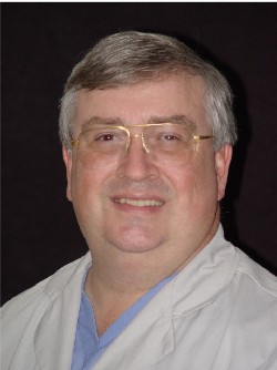 Dr. Hughey in scrubs